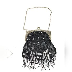 Mattina T. Roaring Twenties inspired fringe kiss lock beaded black bag